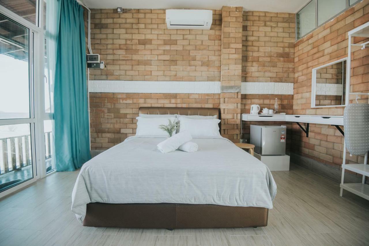 Ombak Deru Lodge Marang Buitenkant foto